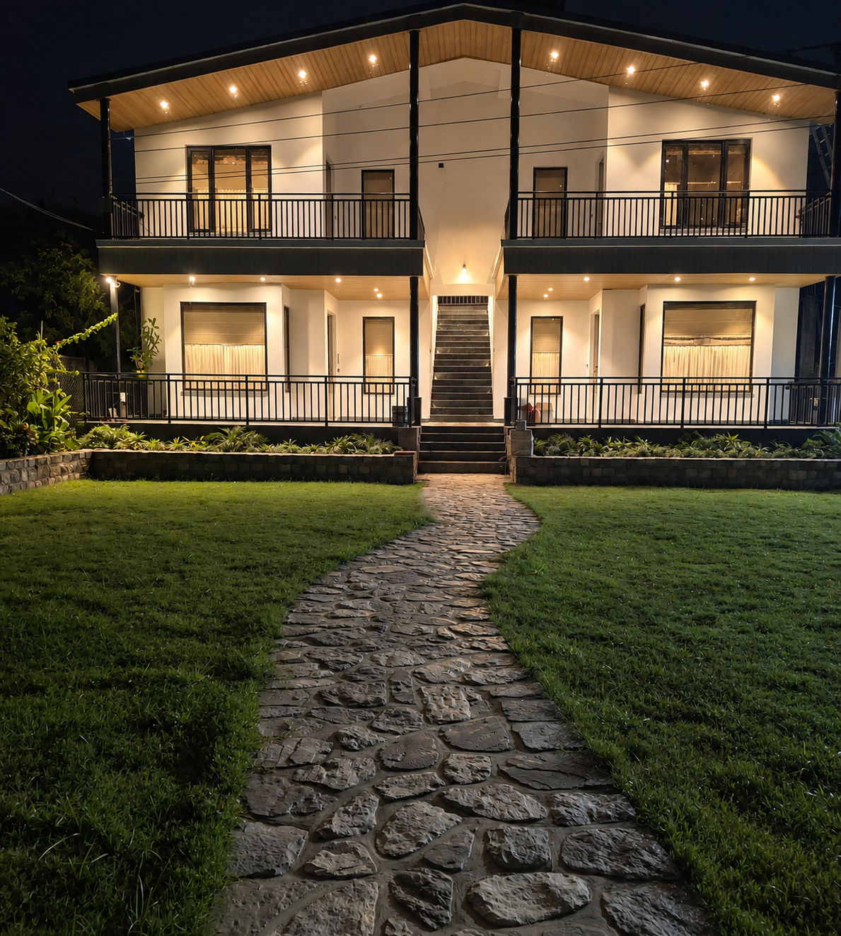 Heaven River Retreat illuminated resort exterior at night in Kunkhet, Uttarakhand near Jim Corbett National Park